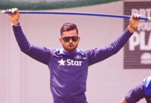 Virat Kohli in sunglasses during an India training session