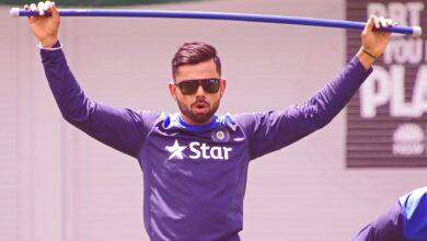 Virat Kohli in sunglasses during an India training session